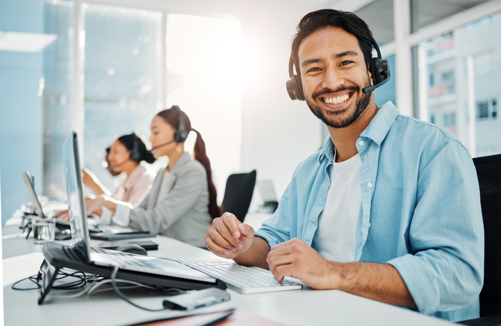 call center man simling with headphone