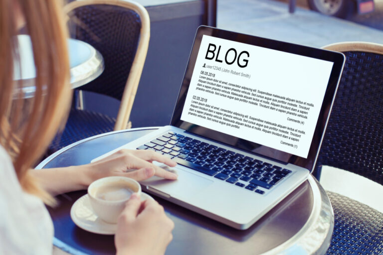 Women writing a blog in Dubai